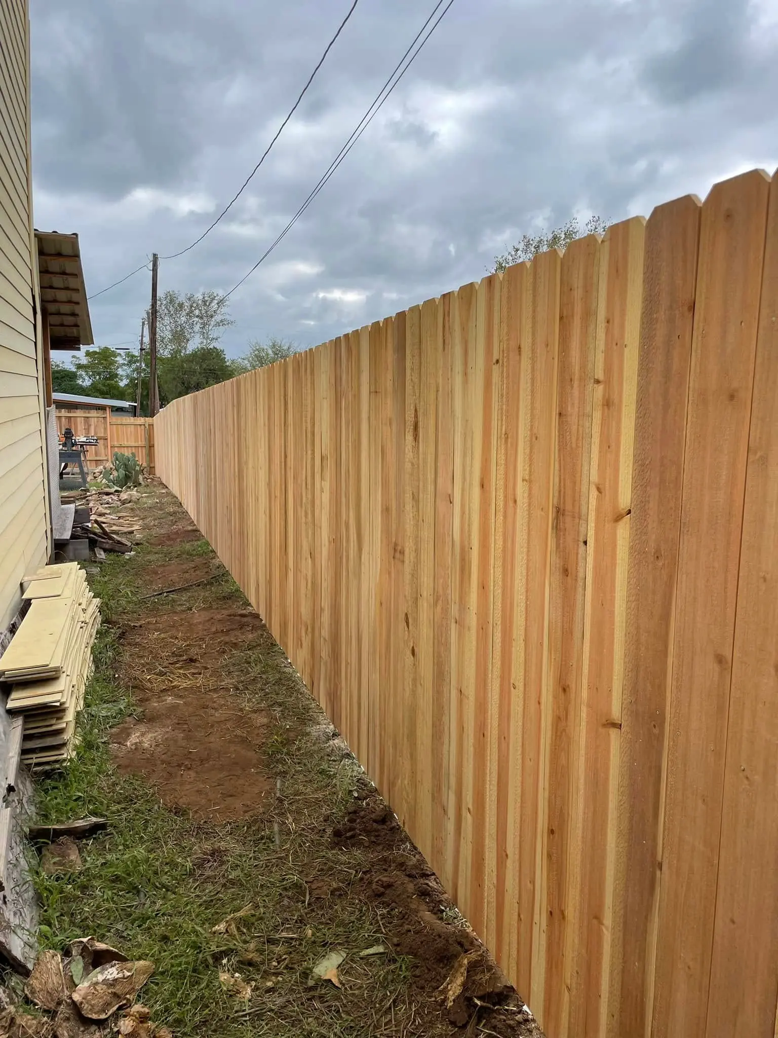 Wooden privacy fence installation by VP Welding in Burnet TX